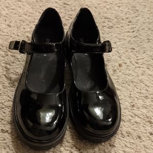 Black strap shoes